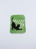 Crochet Stretching Cat Coaster – Green with Black Cat Silhouette