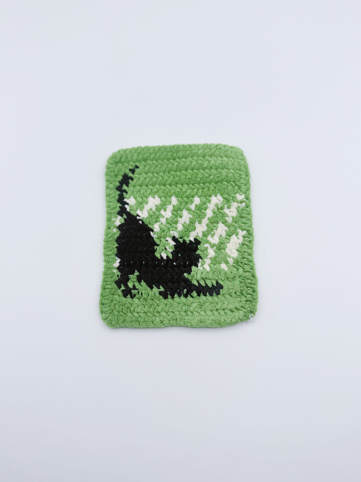 Crochet Stretching Cat Coaster – Green with Black Cat Silhouette