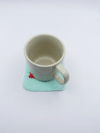 Crochet Dog in Red Rain Boots Coaster – Mint Green with White Pup