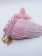 Crochet Conch Drawstring Bag – Blush Pink Shimmer with Gold Metal Chain