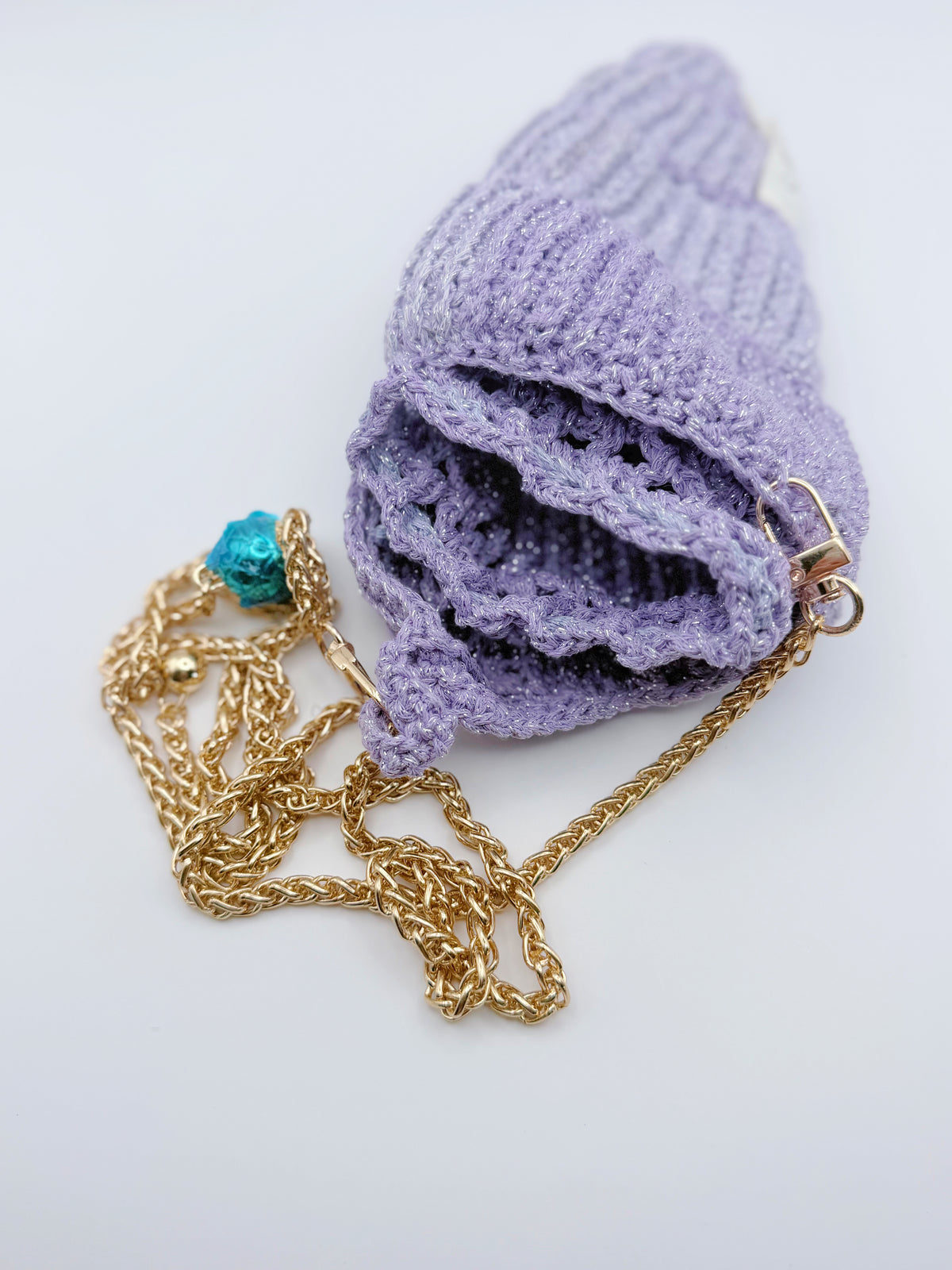Crochet Conch Drawstring Bag – Lavender Shimmer with Gold Metal Chain