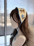 Knitted Headband – Cream with Brown Horse & Blue Floral Intarsia Pattern