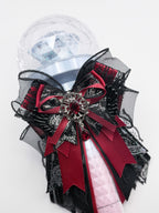 K-Pop lightstick bow decoration in black rose print and burgundy with dark angel wings and gothic ruby brooch