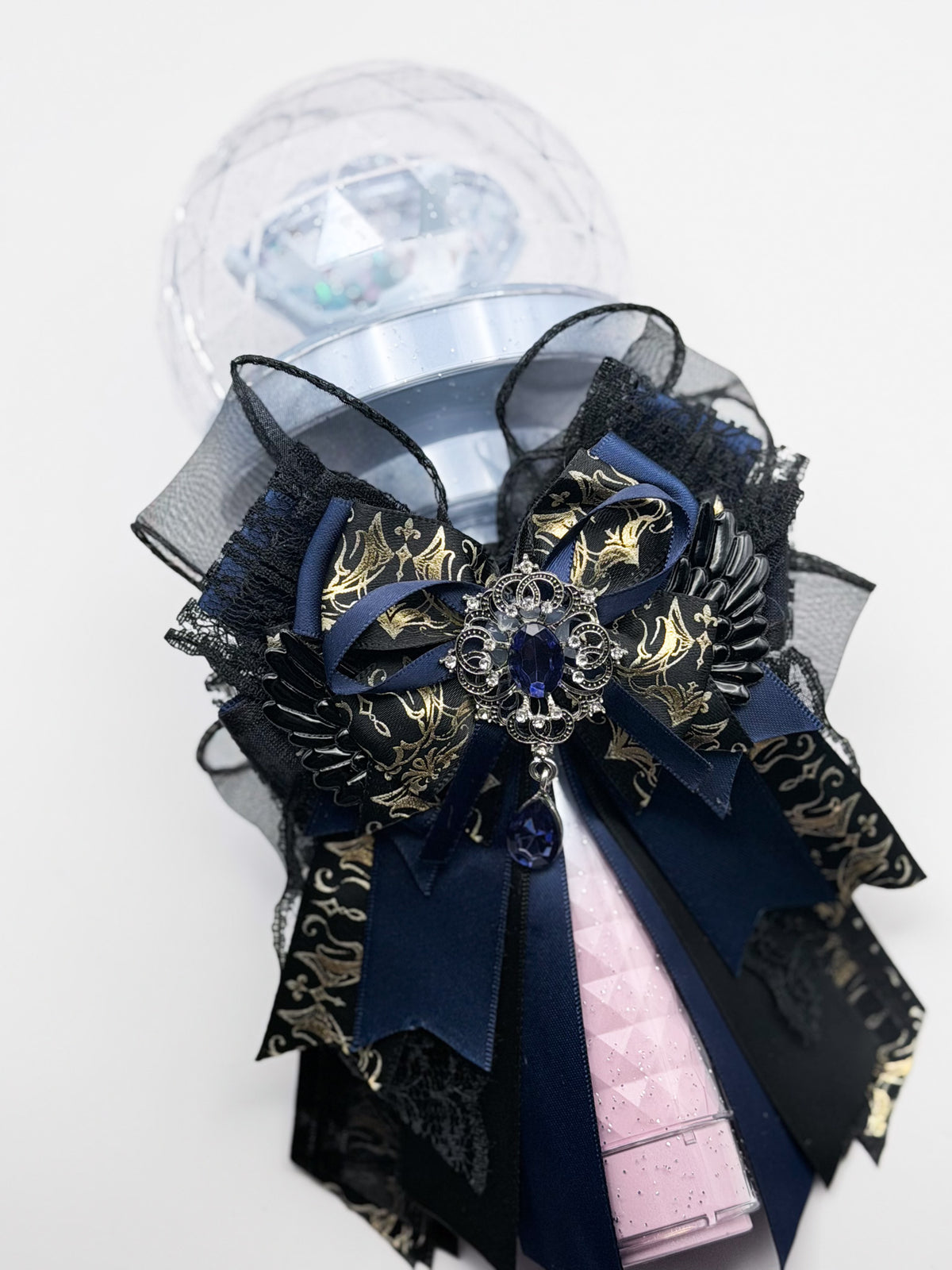K-Pop lightstick bow decoration in navy blue and gold brocade with black lace and gothic silver brooch