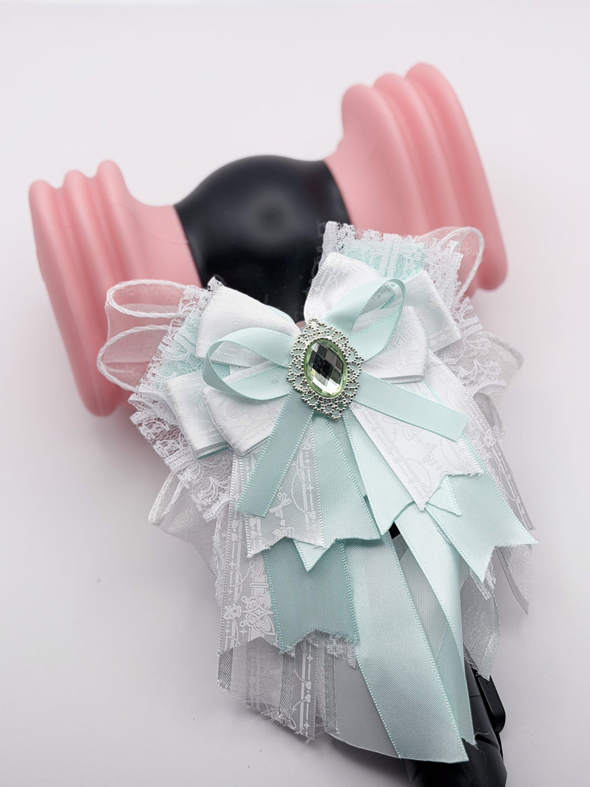 K-Pop lightstick bow decoration in mint green and white with silver crystal oval brooch and white lace